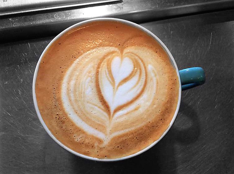 TwigsCafeLLC's tweet photo. Cortado Tulip inside of a heart. #espresso #latteart #barista #CoffeeLover #coffee #cafe #business @AEroasteryCafe https://t.co/ZlrQrMTTLE
