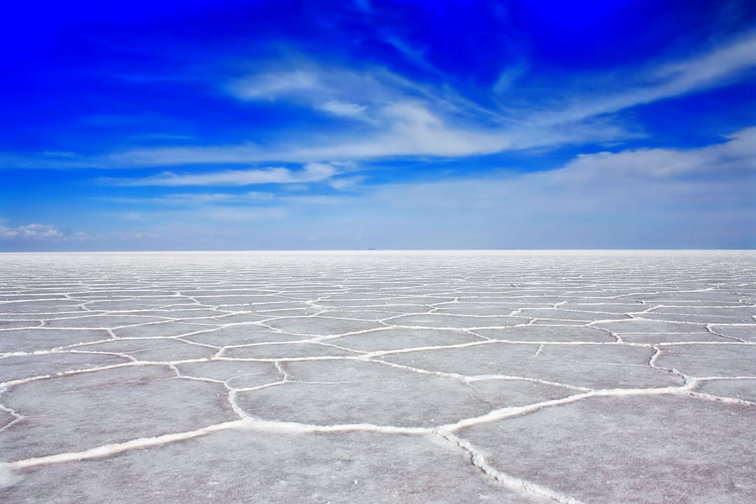 atlasandboots's tweet photo. A2: Salar de Uyuni in Bolivia was certainly unusual. Miles and miles of salt flats create an alien landscape perfect for photos. #LPchat https://t.co/HCWIoewvz3