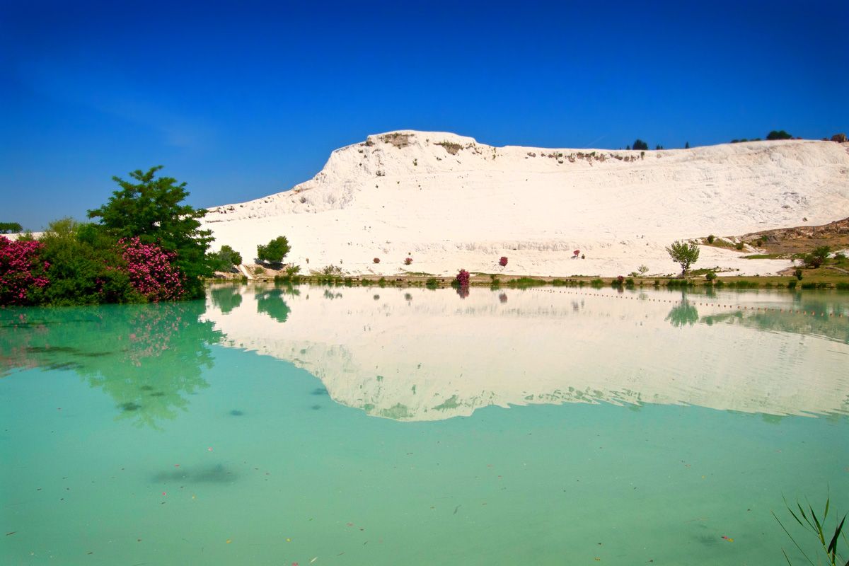 atlasandboots's tweet photo. A2: Keeping with the theme of alien landscapes, the travertine terraces of Turkey's Pamukkale were surreal #LPchat https://t.co/Tm0o1VYJGJ