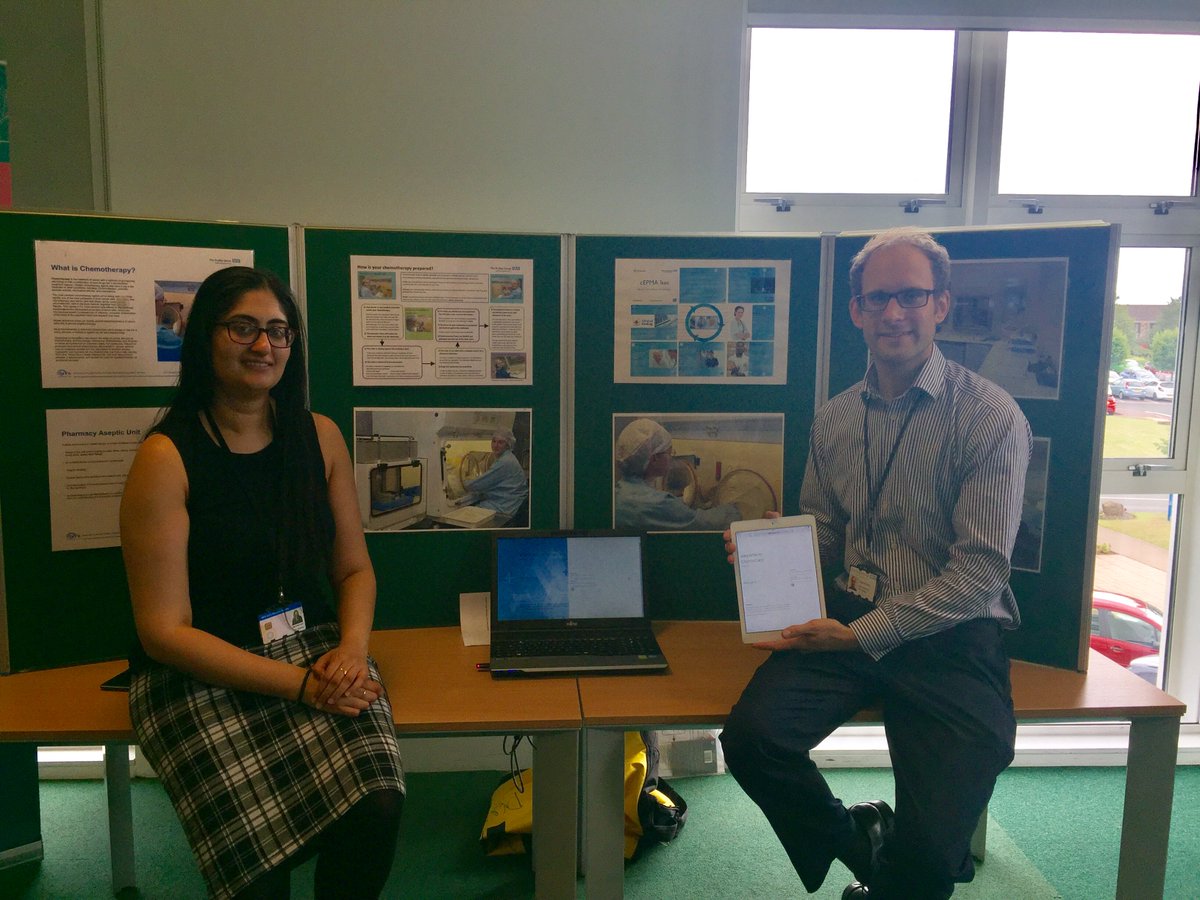 DudleyGroupNHS's tweet photo. Pharmacists Graeme Hood and Dav Manku informing people about chemotherapy treatment and how it's prepared in our aseptic unit 
#AMM2017 https://t.co/9iwMehooD1