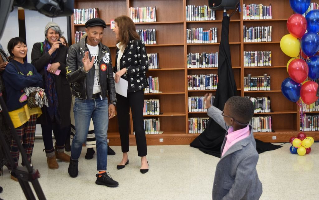 FirstBook's tweet photo. #TBT In 2015, we were so HAPPY to join @PharelI & @penguinkids for a reading of his #picturebook, "Happy!" at @BKLYNlibrary! #FirstBook25 https://t.co/YAnaLSMV5M