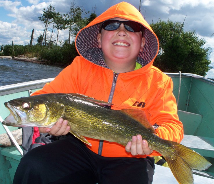 Who has the better smile? (Hint: it probably isn't the fish!) #PashaLake #fishing #fish #gonefishing #lakelife