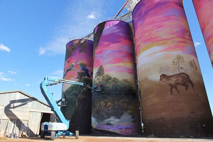 abclandline's tweet photo. Larger than life outback landscape is #Queensland's newest silo artwork https://t.co/rUq32VUDzu https://t.co/fd67QPEmvc
