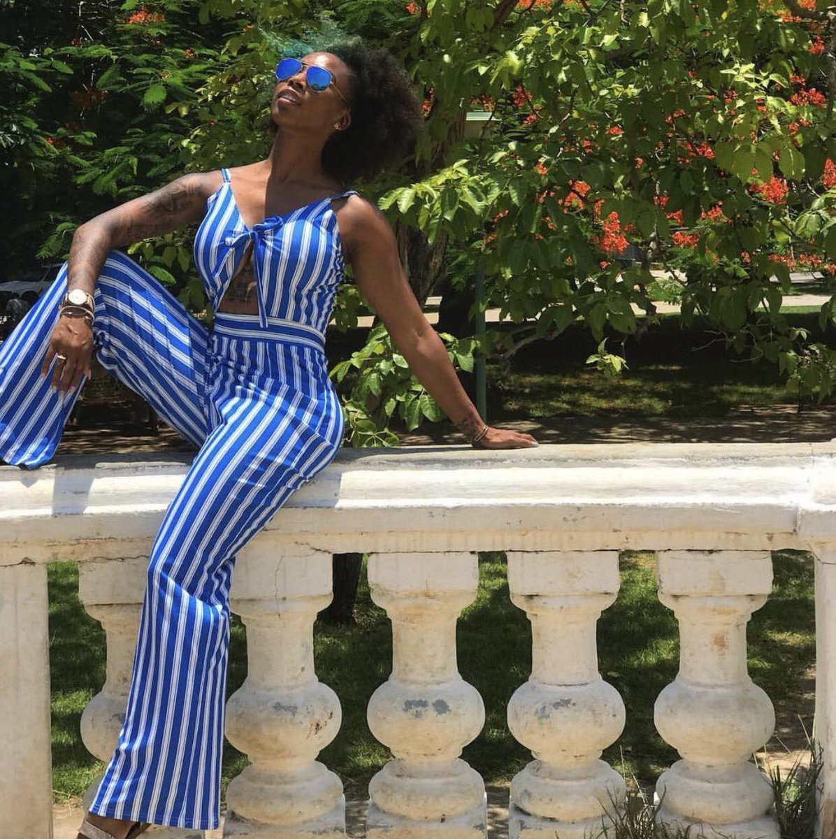 oursbyblackjoy's tweet photo. Sit back and soak up the rays. ☀️ 📷 @trapyogabae 
#selflove #blackgirlmagic #OURSbyBlackjoy #blackjoy #itsOURS #summervibes #naturalista https://t.co/xupfZqqhdx