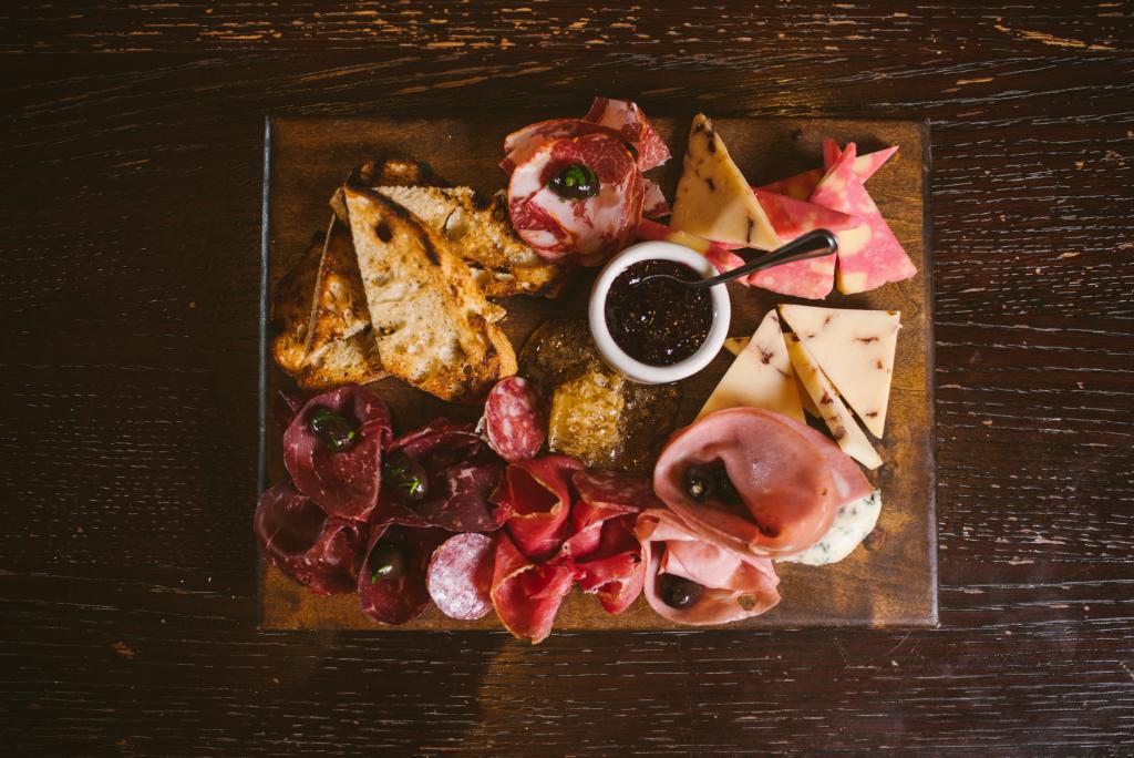 RedSquareLV's tweet photo. Who can say no to a plate full of cheese? Our artisan meat+cheese plates are served with jam, honey, olives, and grilled bread. #RedSquareLV https://t.co/LgQrMsql6z