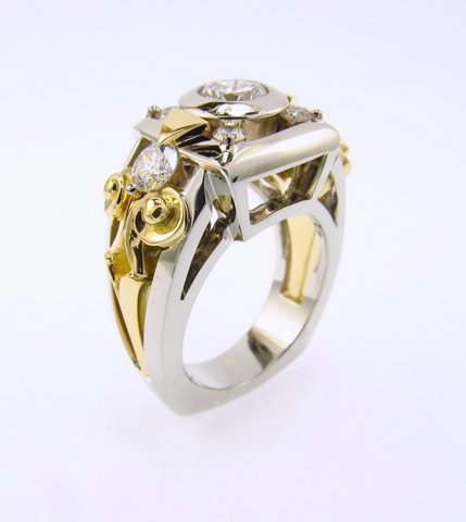 YankeDesigns's tweet image. Ladies  custom designed 18kt white &amp;amp; yellow gold ring w/ .71ct round brilliant cut major diamond &amp;amp; .65ct total weight of 6 smaller diamonds.
