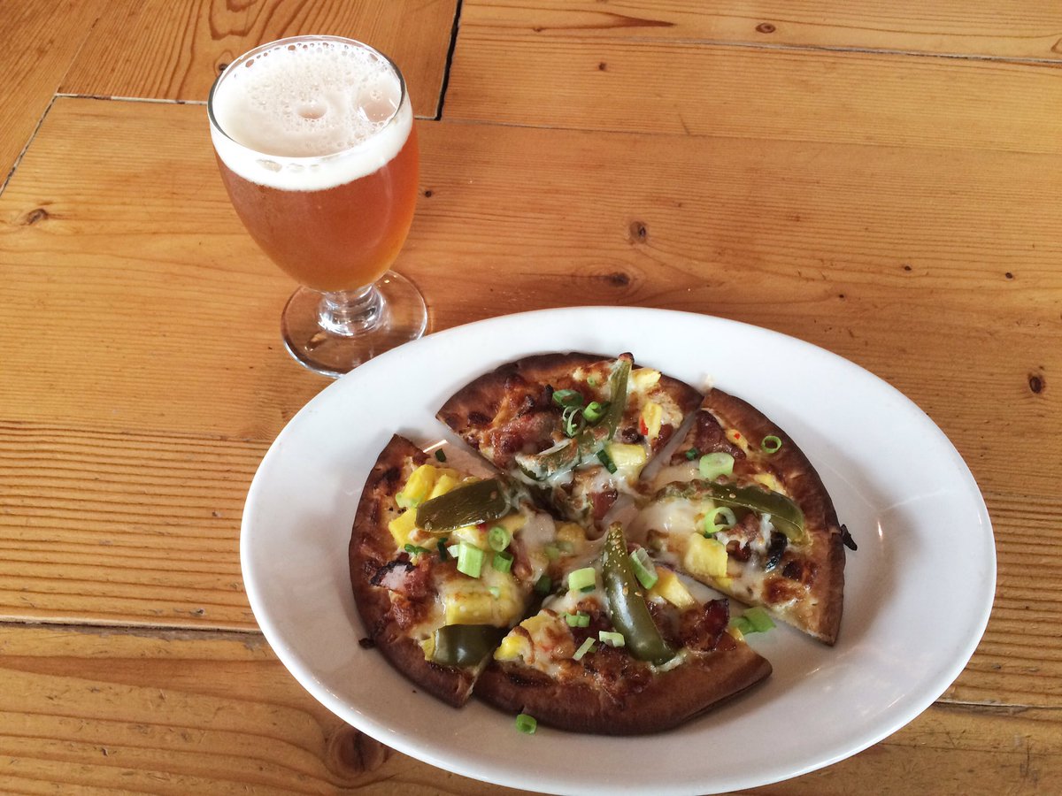Our Pizza Thursday special is a Sweet Heat 'za:garlic sauce base, mozzarella, sweet chili bacon, pineapple, pickled jalapeño and green onion
