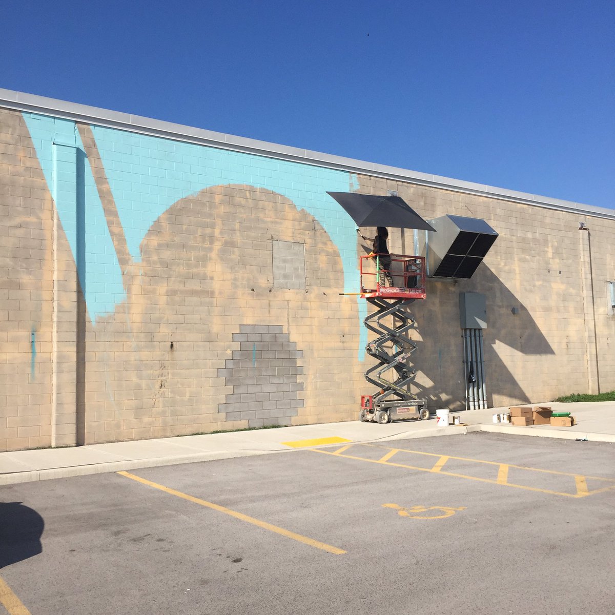 HOPAports's tweet photo. Priming is underway for the new mural with @shalakattack @bruno_smoky @CollectiveHam #thewallproject #HamOnt https://t.co/KKGu1fz3zf