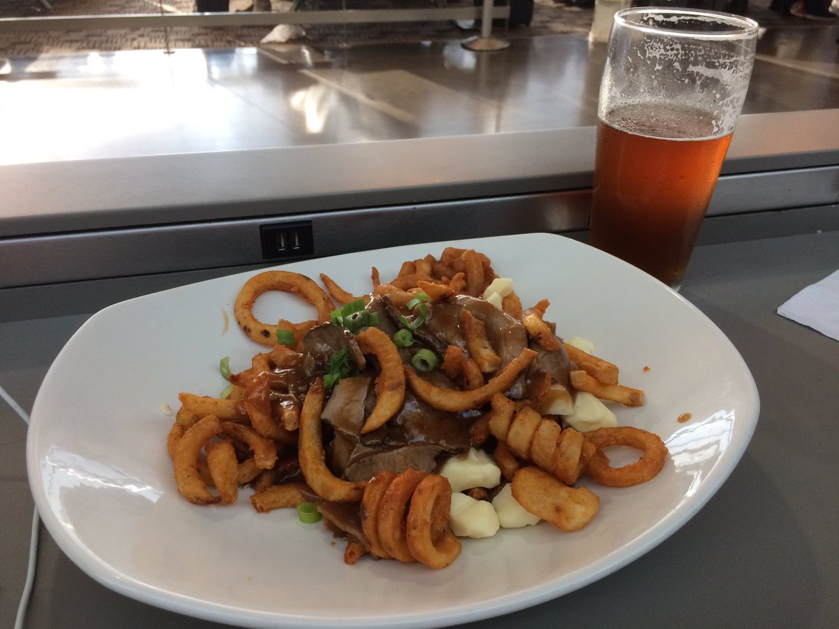 KevinH_PhD's tweet photo. Heading home from a quick trip to Montreal to present at @SSIBsociety #ssib2017 and I finally had a few minutes to enjoy some poutine! https://t.co/vko6dUor6i