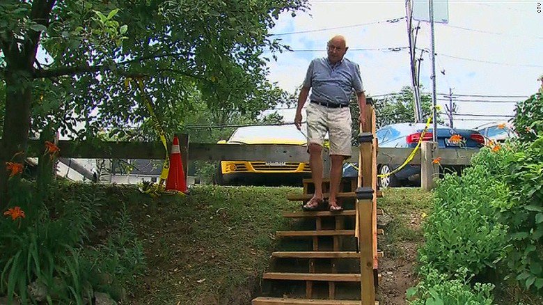 CNN's tweet photo. City says steps will cost at least $65,000; man builds them for $550 https://t.co/71XWqLxq7W https://t.co/HtMseHlLrH