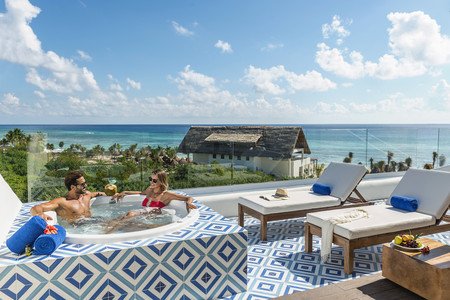 WeddingWire's tweet photo. Beach backdrop and a bottle of bubbly! All the makings of the dreamy wedding destination! @OCEAN_HOTELS https://t.co/gXobRqpmw5 #PartnerAd https://t.co/hOGZCFOX7G