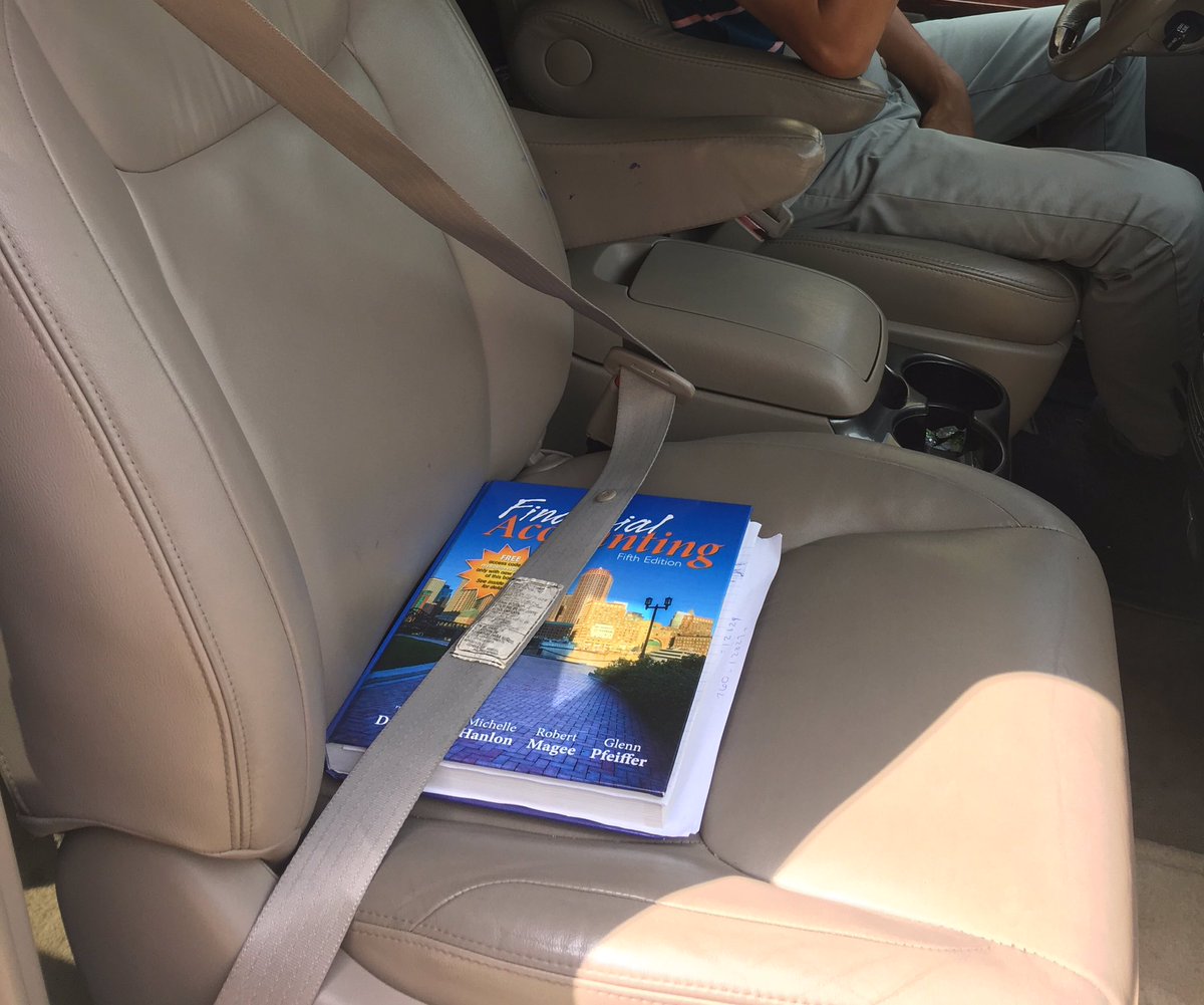 brittanyphil's tweet photo. I left my textbook at school and my friend said he'd get it to me. It just arrived in an Uberpool with two random and confused passengers https://t.co/l14T9UsIVT