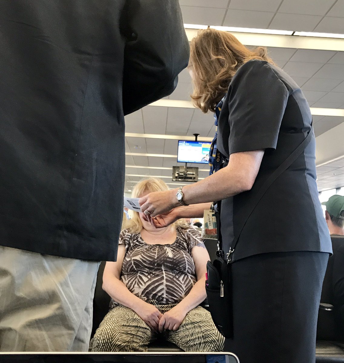 al_arun's tweet photo. The good side of #UnitedAirlines . A gate agent consoling a passenger flying to Boston on the passing away of her mother!! Kudos United!! https://t.co/IQWajNHrzC