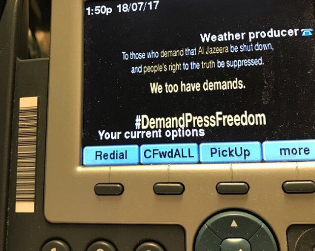 FemiOke's tweet photo. Meanwhile @AJEnglish HQ — “Even the company work phones are taking up the cause #qatarcrisis #QatarUnity #pressfreedom” — @KevinCorriveau https://t.co/e7FY4GItez