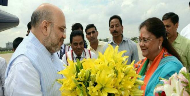 sangpran's tweet photo. Colourful enthusiastic albeit #RainDrenched welcome 2 @AmitShah by @BJP4Rajasthan @VasundharaBJP 
#feedback time &amp; target is 2019 via 2018 https://t.co/E1Z1RIa1Eq