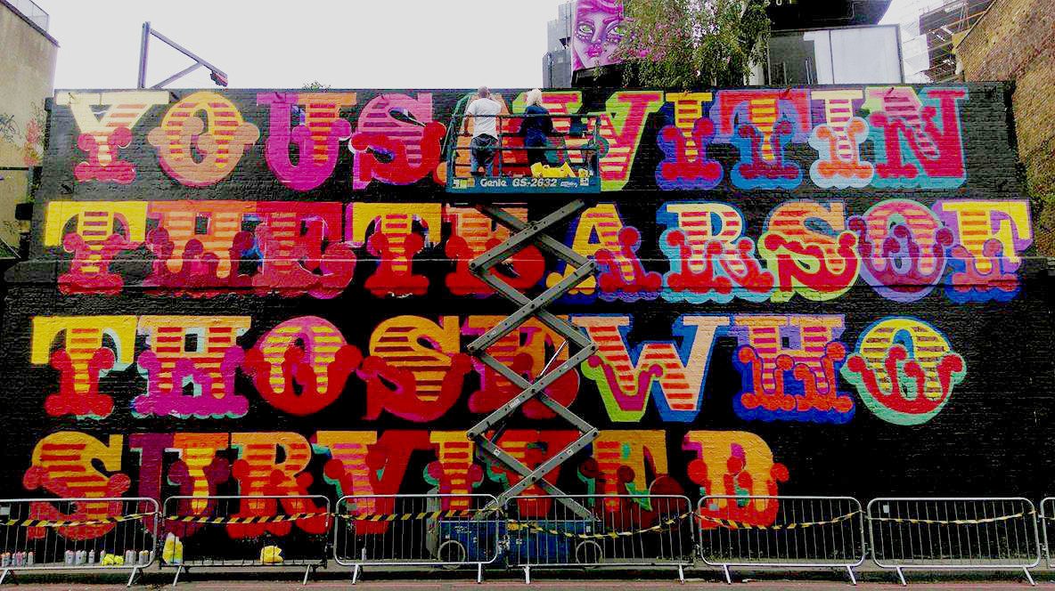 citizenM's tweet photo. In the making: The new street art outside #citizenM London #Shoreditch, painted in memory of the victims of the Grenfell Tower fire. https://t.co/9oYW0gizio