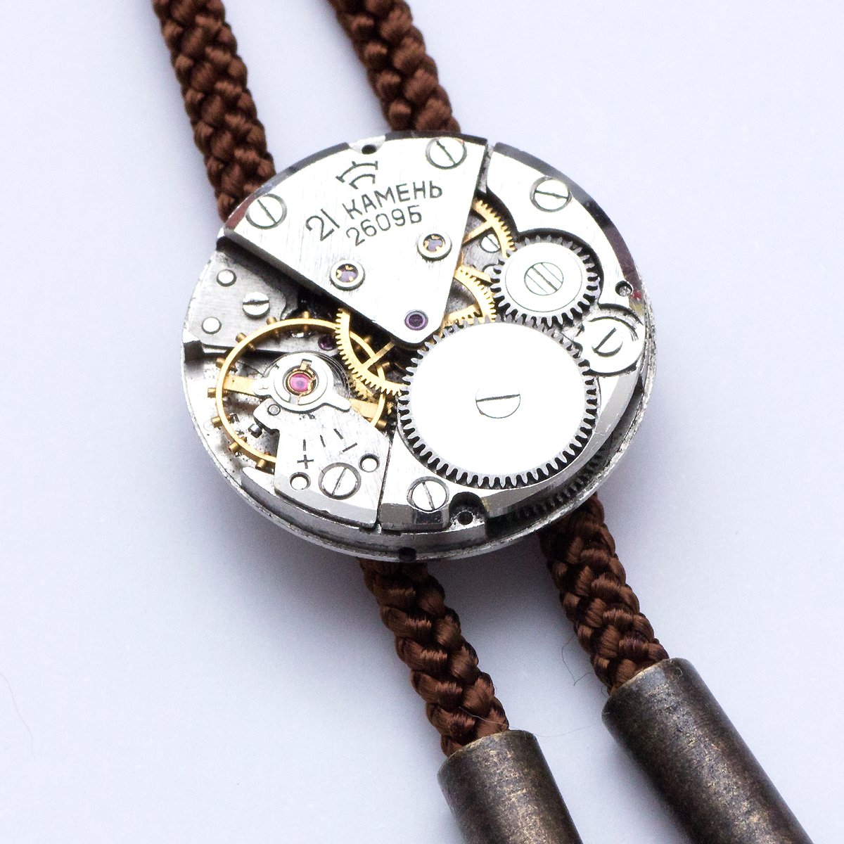 tie_on_acce's tweet image. 【作品紹介②】
「機械式時計ループタイ」
黒、茶、紺、えんじ、緑、灰色のお紐　各3,000円
#博物ふぇすてぃばる #tieon