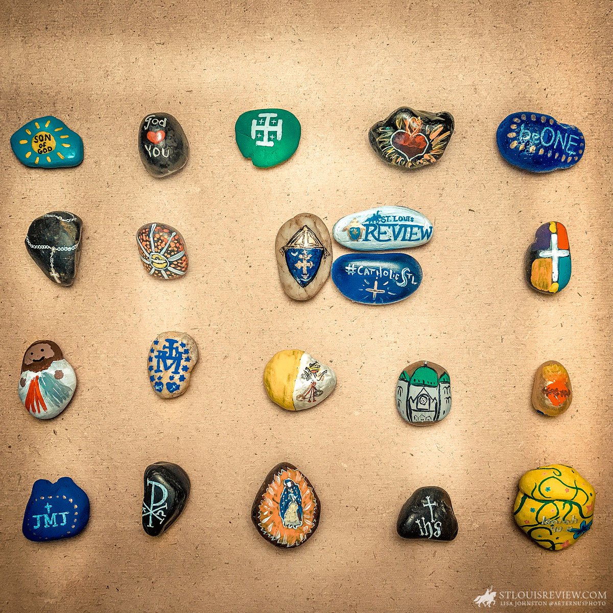 StLouisReview's tweet photo. Forget Pokémon GO. Painted rocks are this summer’s hottest trend. Here’s how we’re using it to evangelize others https://t.co/qiOzmqeIRT https://t.co/AcRrcRfmRr