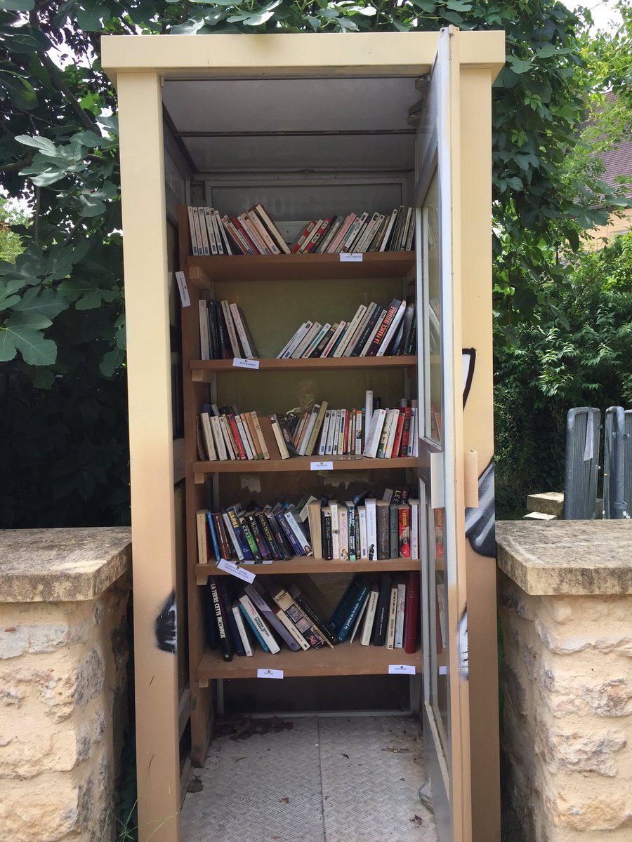 VoiciSarah's tweet photo. Continuing my little series of 'tiny libraries in the Périgord' --here's one in a phone box. https://t.co/7CB17GZbu2