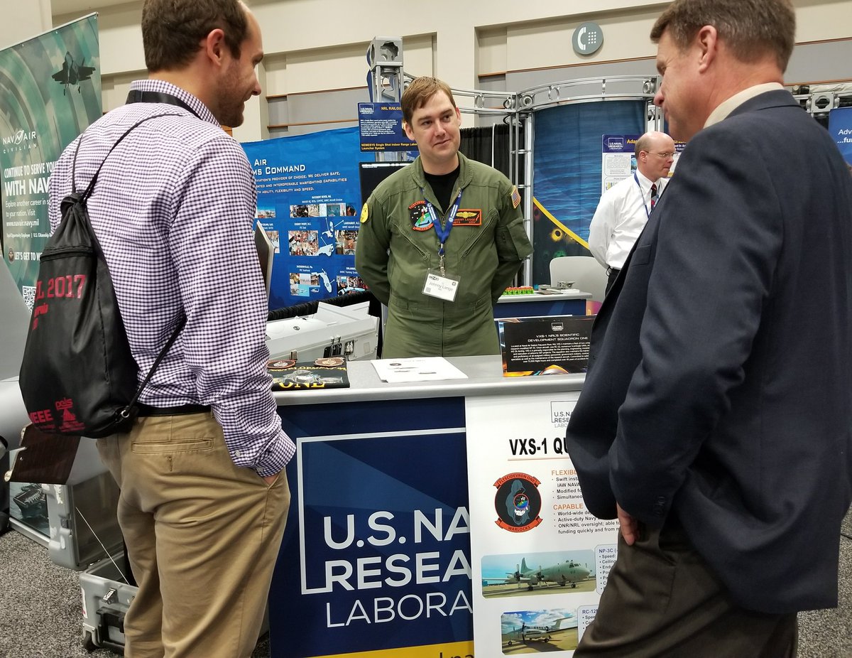 USNRL's tweet photo. Petty Officer 2nd Class Johnny Lange briefs @vxs1 capabilities @ Future Force Tech Expo. VXS1 is part of @USNRL. #NavalTechExpo #Navy https://t.co/rs3vkz16JH