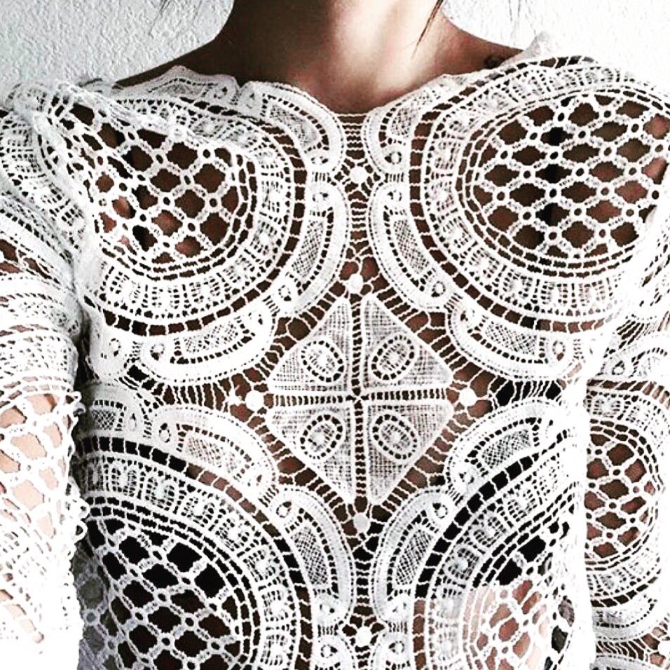 OS_Designs's tweet photo. We are obsessed with this white @Balmain crochet knit top! https://t.co/r1Zqw3JdZX