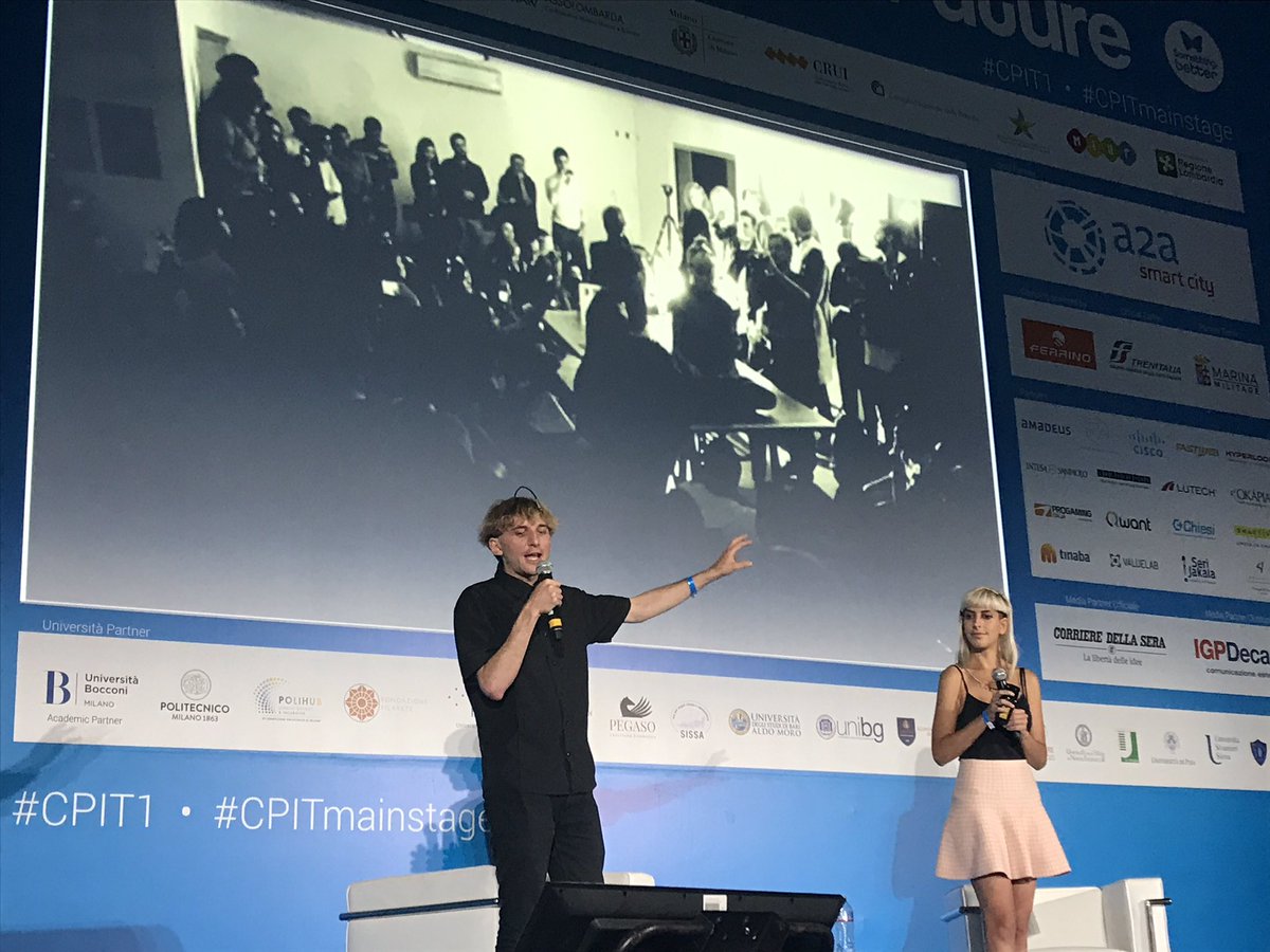 soc_rep's tweet photo. "Cyborg Art: usare internet come nuovo senso per percepire cose al di fuori di questo pianeta." Neil Harbisson e Moon Ribas #CPIT1 https://t.co/F3VpHjEk7y