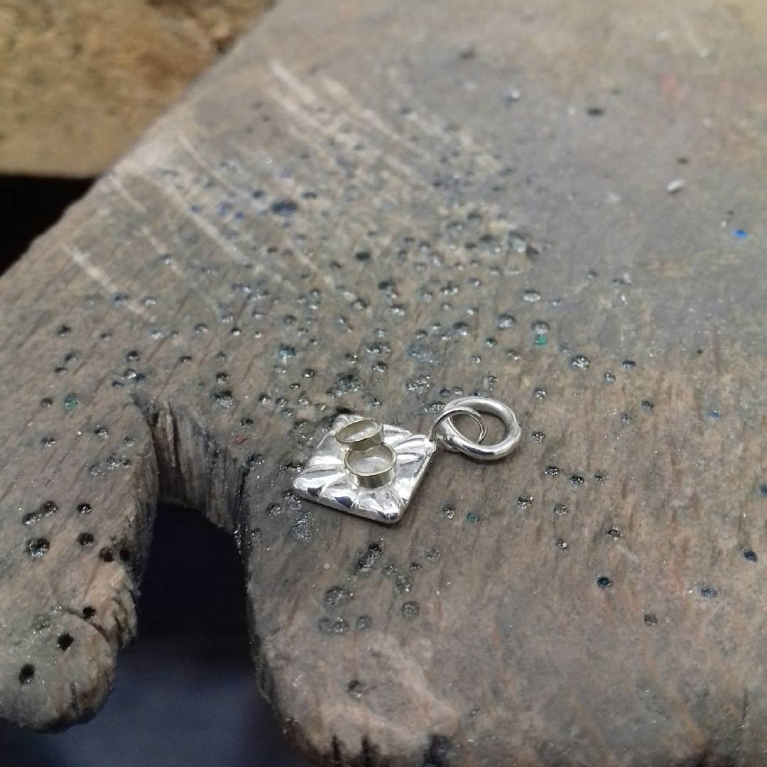SianBostwick's tweet photo. Freash from the workshop, bespoke tiny wedding charm 💒 2 little gold rings on a silver pillow 💌 for your bespoke jewel dreams https://t.co/CuP4MPtsbH