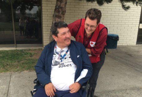 Ira with Canadian Red Cross volunteer; read more about Ira and other evacuees: www.redcross.ca/blog