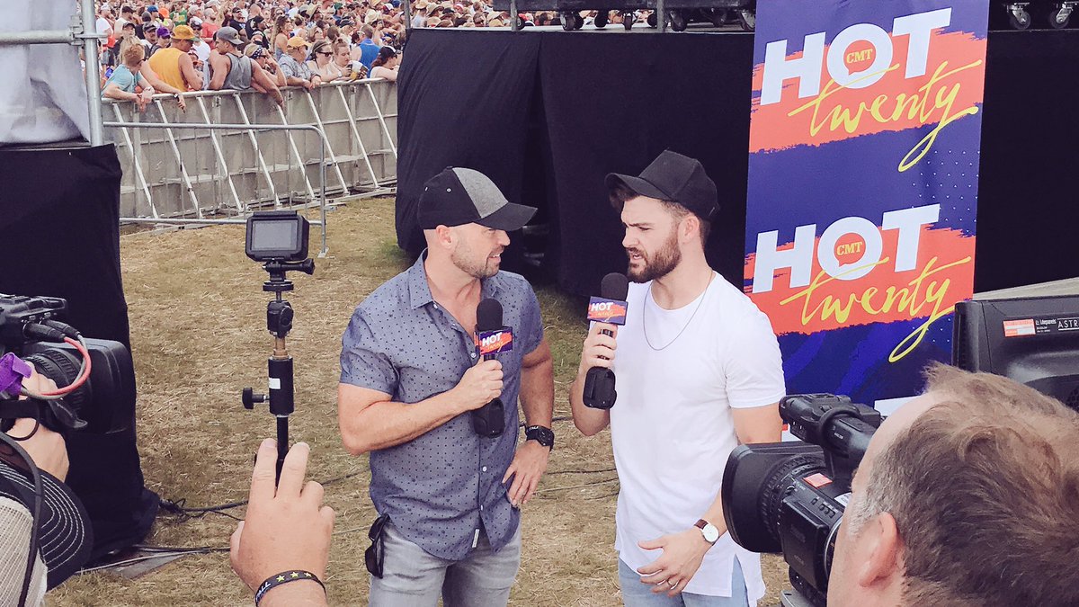 CodyAlan's tweet photo. Interviewing the stars @ @faster_horses in #Michigan. Coming soon to @CMThot20. @DylanScottCntry 

New episode TOMORROW at 9a/8c. https://t.co/sJBWH4zXc3