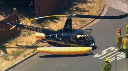 FOXLA's tweet photo. #BREAKING A helicopter crash lands in Sherman Oaks near the 101 and 405 freeways. LIVE: https://t.co/kc8evhgud4 https://t.co/W7eheA4omb