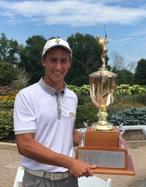 Timmy Hildebrand with the Arthur Ellis trophy.