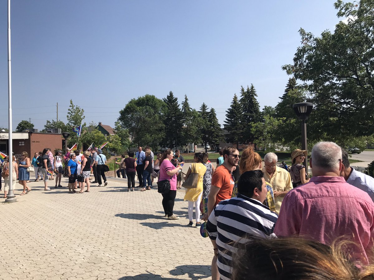 1063jetfm's tweet photo. First ever Pride flag raising at city hall now! Also don't forget tomorrow the Pride March is at 11 at city hall! #summerfunrunner https://t.co/ICLfQjQpoT