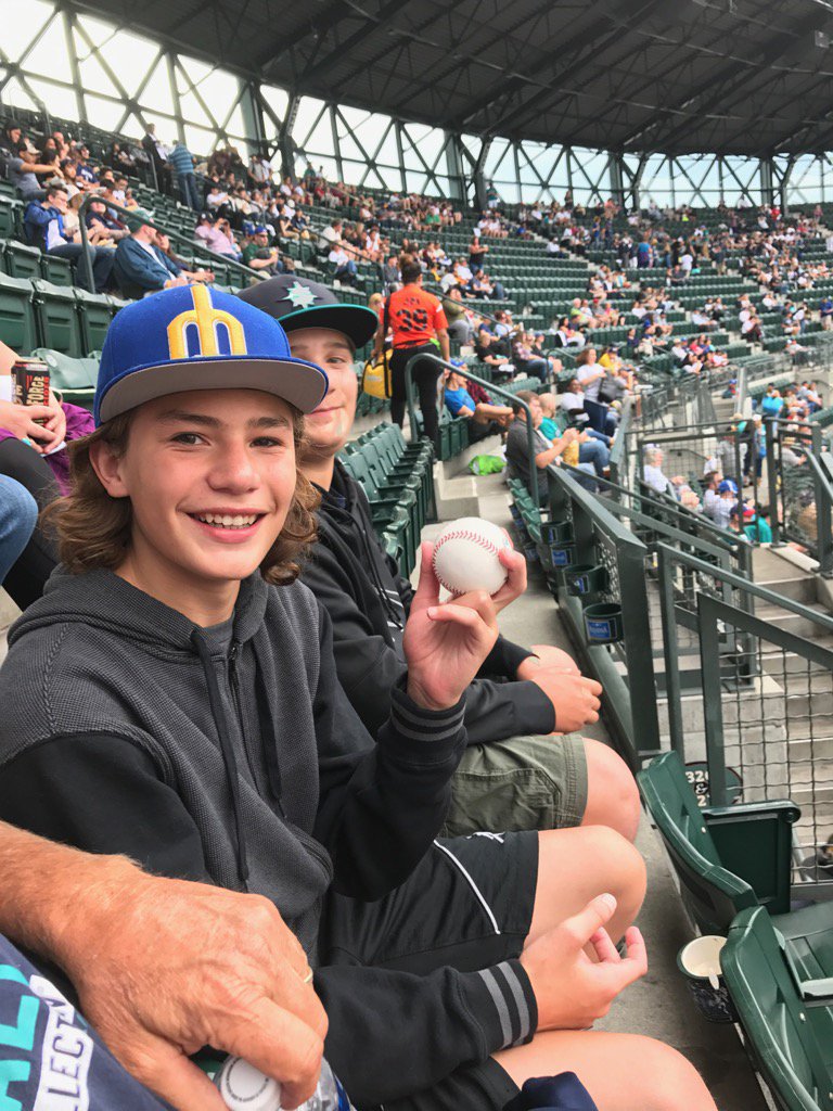 Lisa_Lande's tweet photo. First time for Will from Idaho to root inside the stadium!! AND he caught a ball during BP! #WhereIRoot #GoMainers https://t.co/6o03C1XkkC