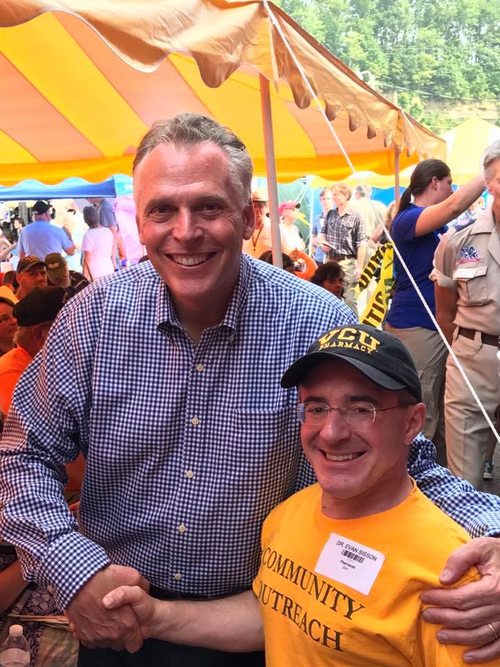 VCUPharmacy's tweet photo. Meeting of the minds! Va. Gov. Terry McAuliffe and VCU School of Pharmacy faculty Evan Sisson at Remote Area Medical (RAM) in Wise. #ramwise https://t.co/j2MBw9A5Q7