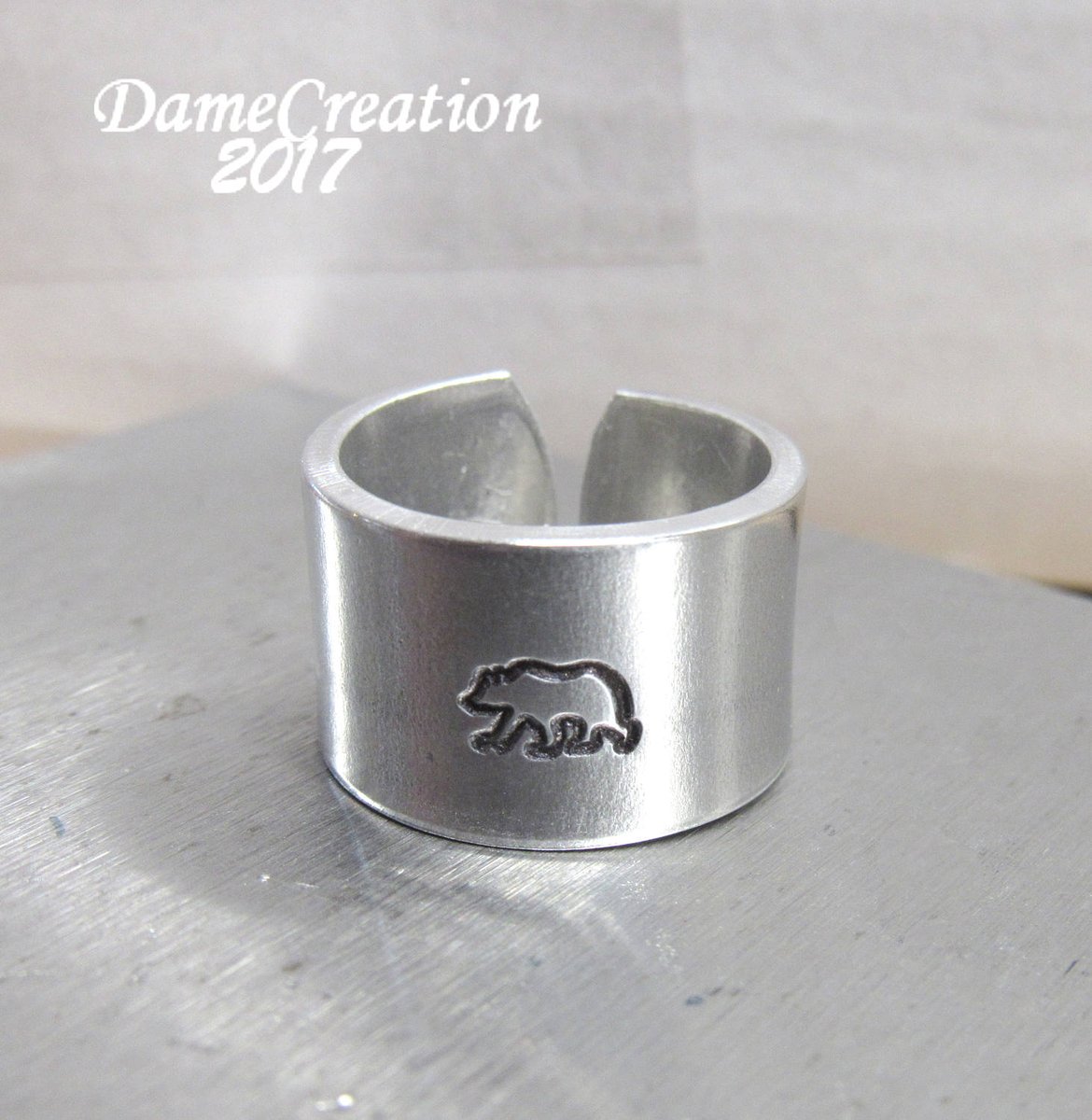 DameCreation's tweet photo. SALE Silver Stamped Ring - Bear Ring - Bear Jewelry - Nature Jewelry -… https://t.co/yMsXuP3WC1 #CraftBuzz #BearRing https://t.co/YwwIDNtFHi