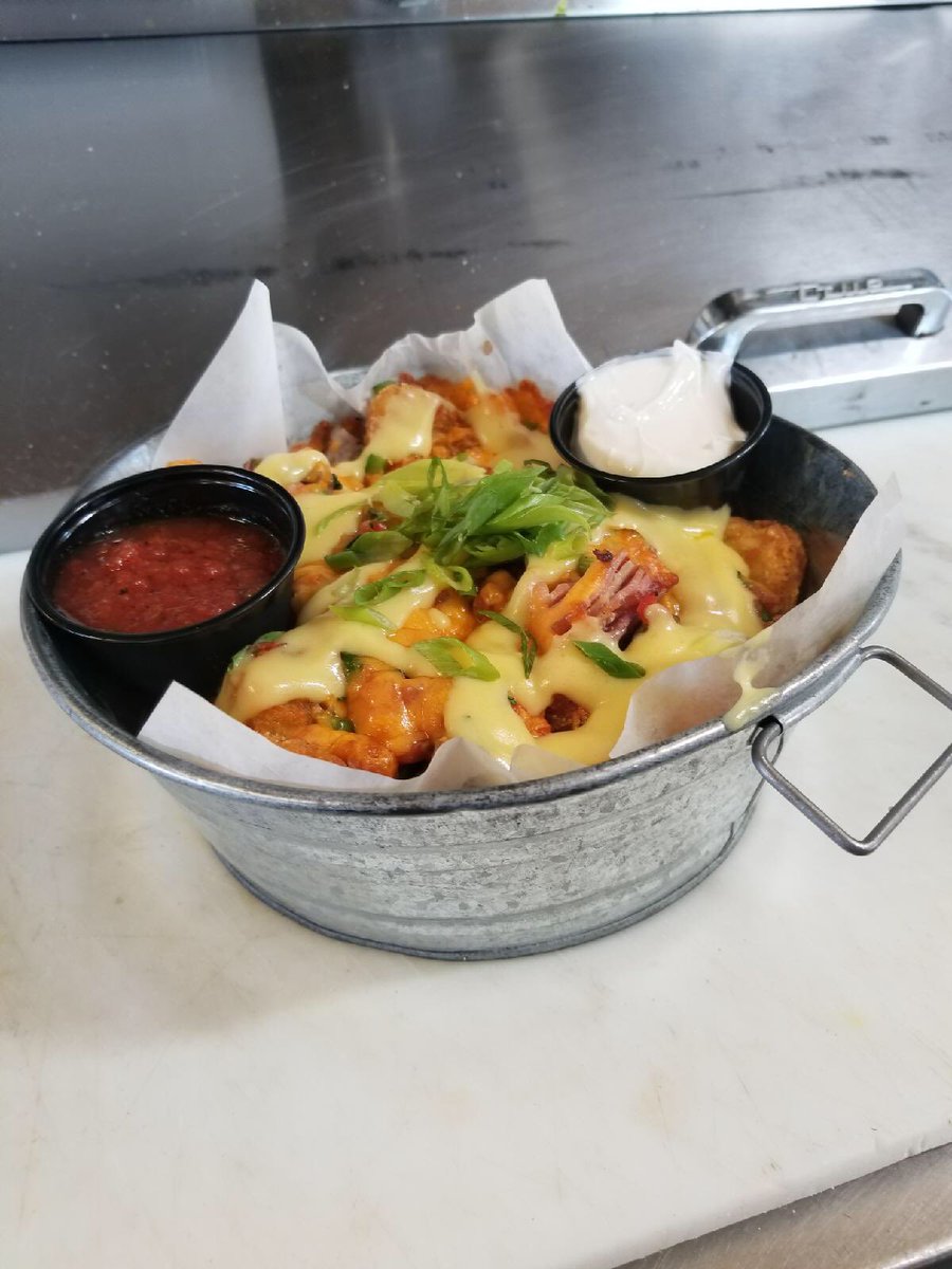 Today's Breakfast Special // Breakfast Nachos /Hash browns/Pico/Hollandaise/Bacon/Sausage/Cheddar cheese 
With salsa and sour cream. 
$12