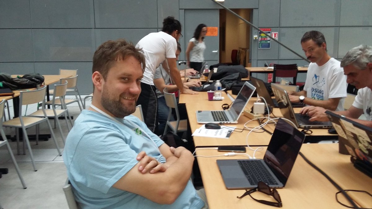 mapbender's tweet photo. Hard work at #OSGeo code sprint at #foss4ge. @atd_schubert is preparing the Debian package for #Mapbender3. Great. Thanks from #Mapbender https://t.co/T20fDC4Qe0