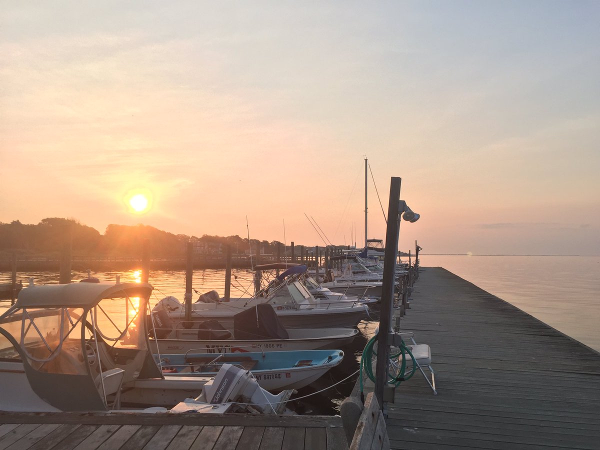 sunfishclass's tweet photo. NY Downstate Sunfish Regional @moriches yacht club looking good at sunset.  #sailing #lightwinds https://t.co/S1wPw2IjB7