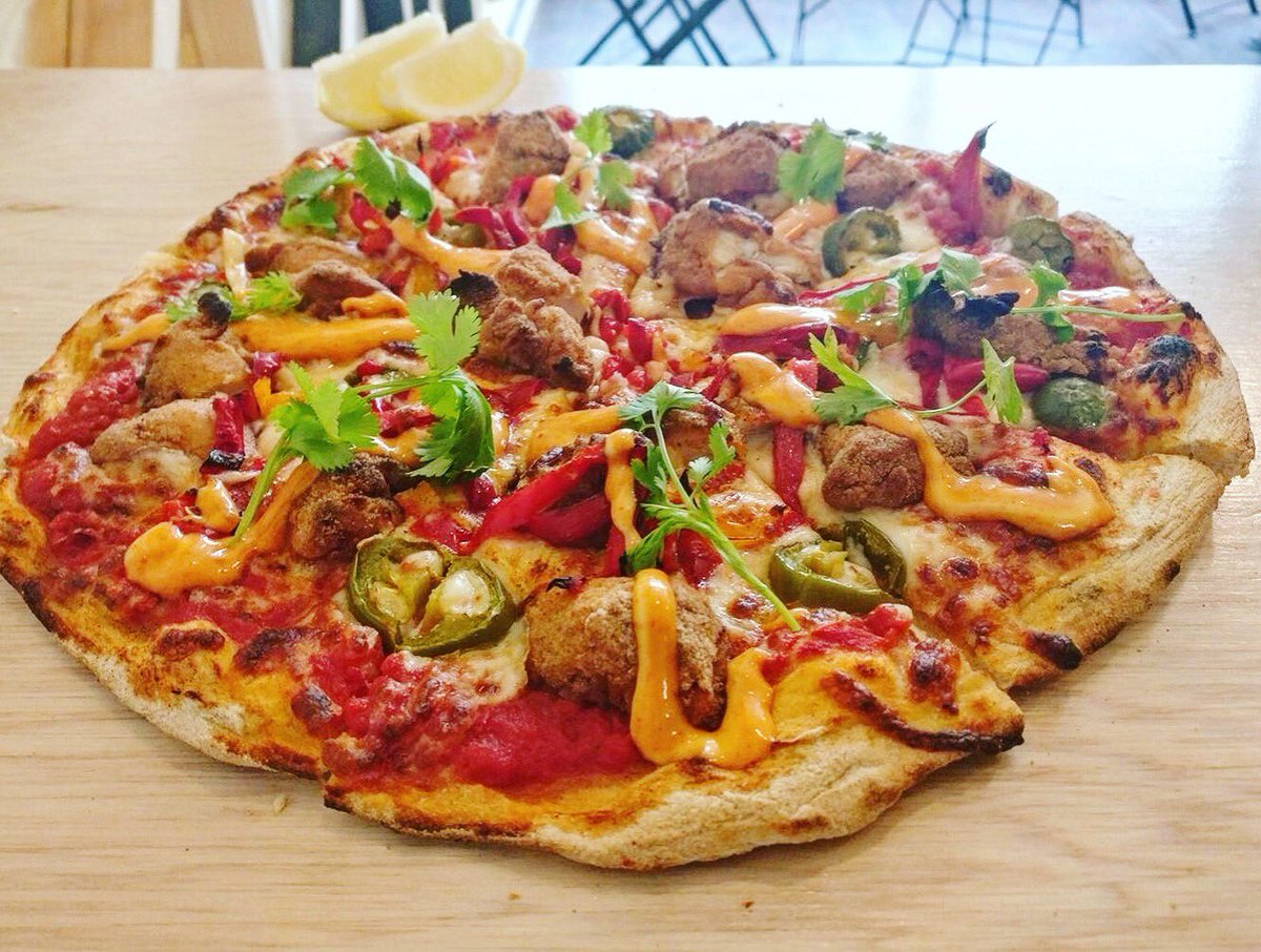 KOREAN FRIED CHICKEN , ROASTED PEPPERS, JALEPENOS, CORIANDER on a Spicy Tomato base, finished with HOUSE MADE SRIRACHI🌶🍗#testkitchen #tocome