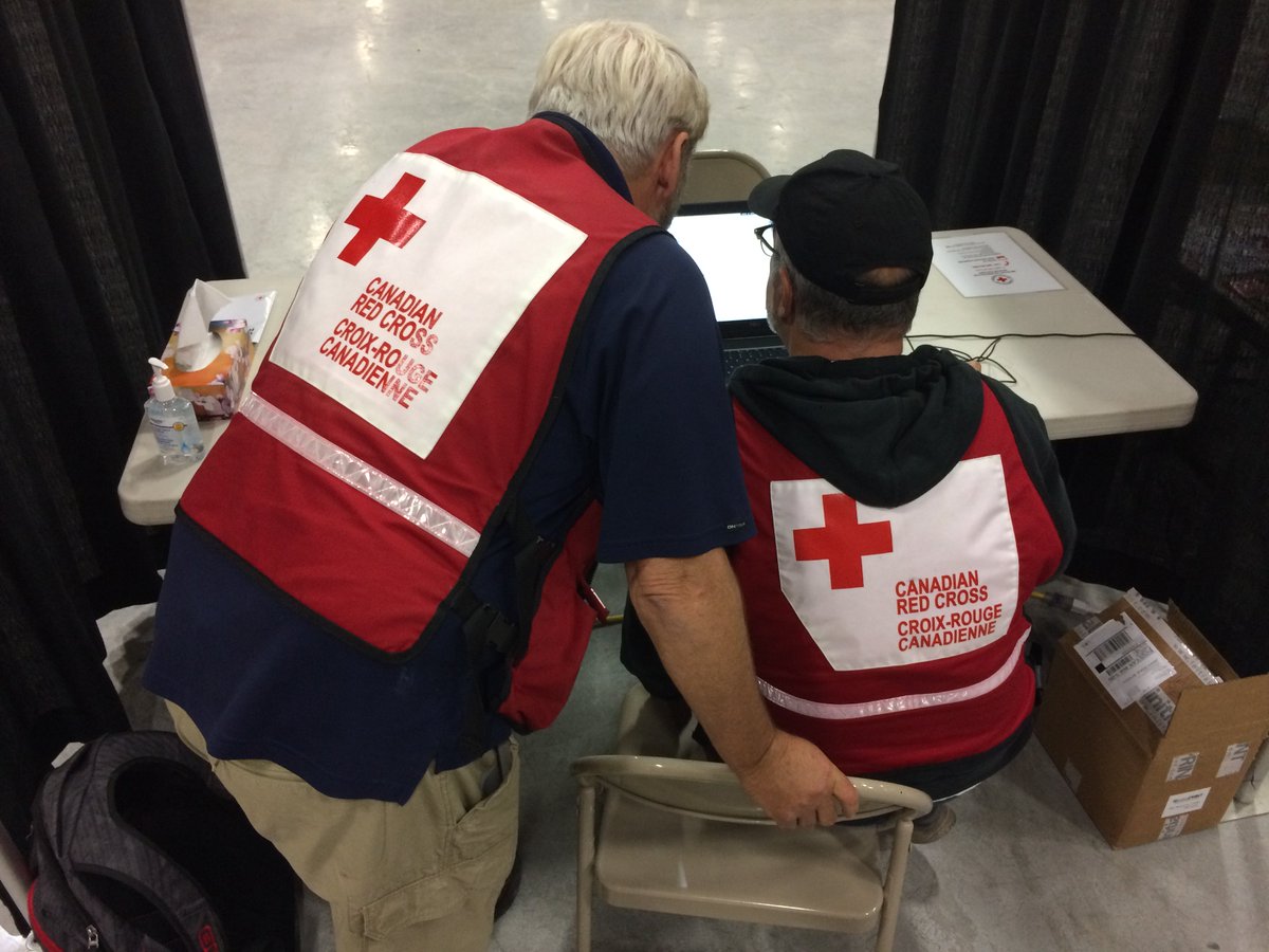 Red Cross volunteers at a table
