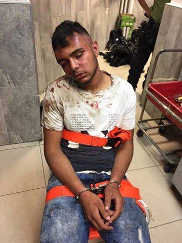 AbbsWinston's tweet photo. Palestinian teen Mu'taz Sa'ida, 18, was cuffed, strapped on chair &amp; brutally beaten by Israeli Occupiers til blood poured down from his eyes https://t.co/rGyZHvIhuD