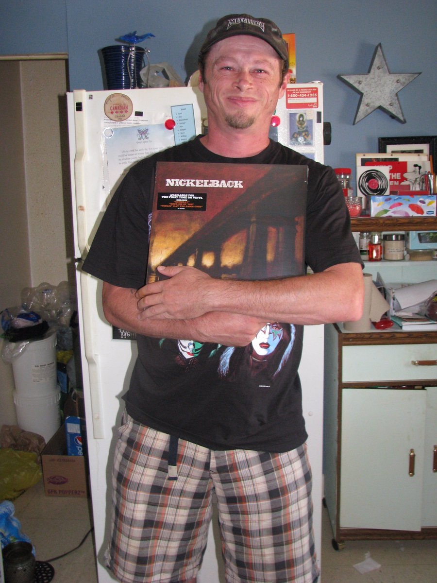 Nickelback2000's tweet image. As you Can see How #ExtremelyHappy I am to have received my New @Nickelback Vinyl in the Mail! Especially the #TheLongRoad One! Love these!
