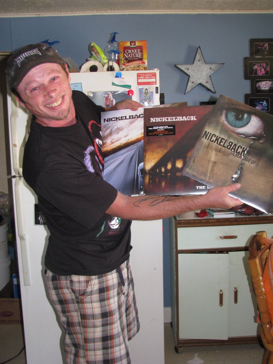 Nickelback2000's tweet image. As you Can see How #ExtremelyHappy I am to have received my New @Nickelback Vinyl in the Mail! Especially the #TheLongRoad One! Love these!