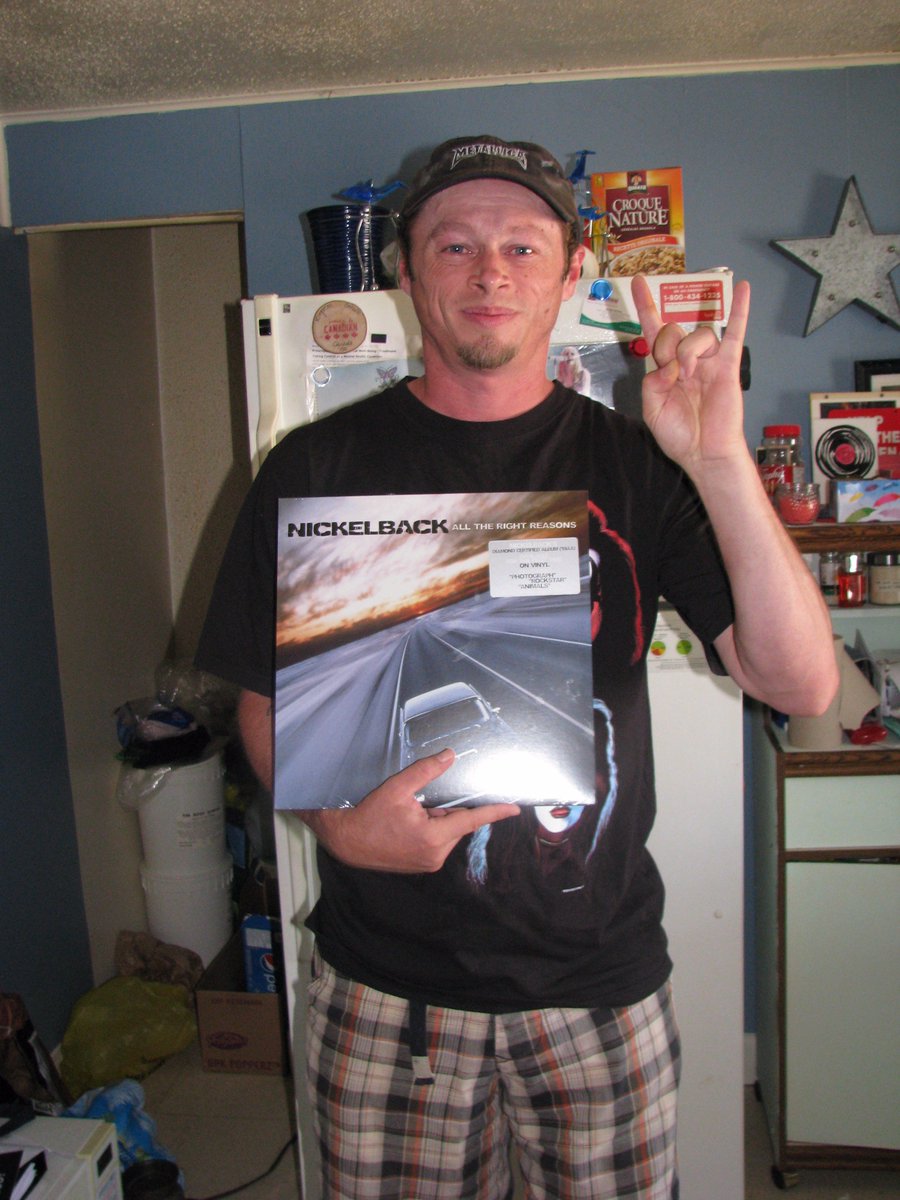 Nickelback2000's tweet image. As you Can see How #ExtremelyHappy I am to have received my New @Nickelback Vinyl in the Mail! Especially the #TheLongRoad One! Love these!