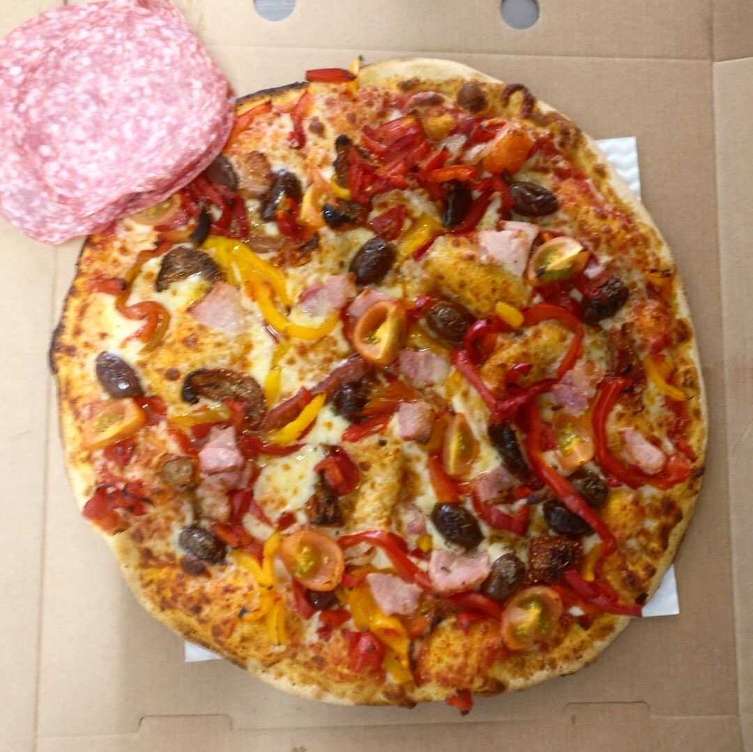 We keep tempting you with PIZZAS not yet available so here is a CLASSIC. ITALIAN SAUSAGE (BEFORE WE RIP THE SAUSAGE ON) + fresh basil 🌱