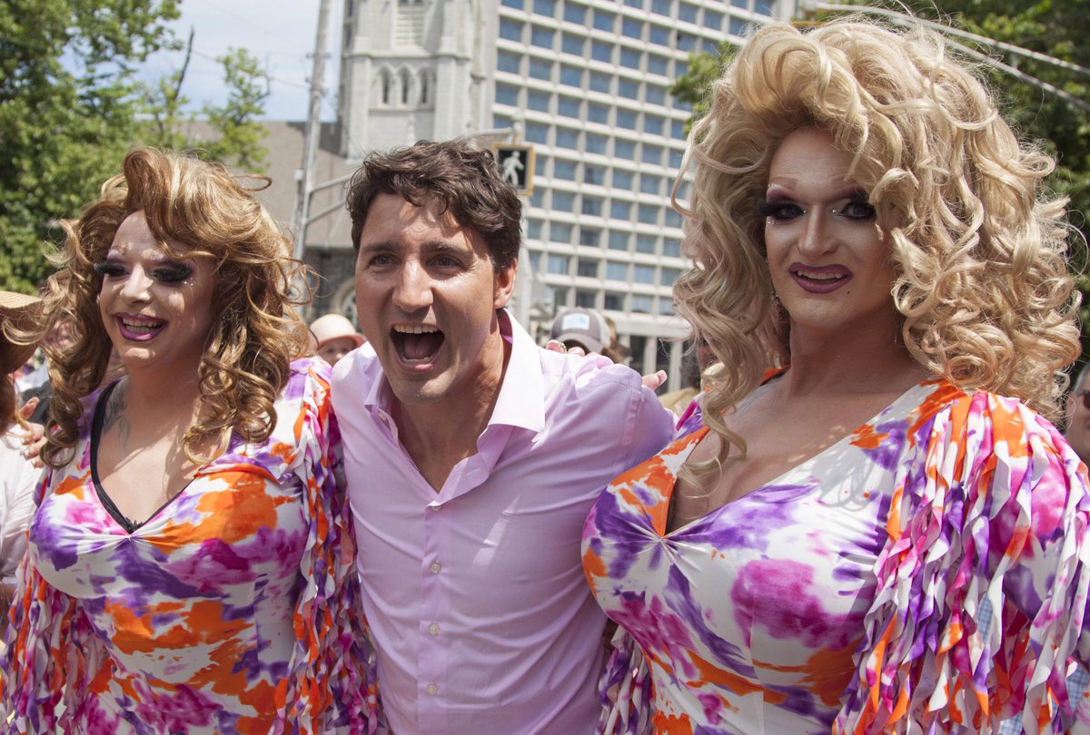 thestarhalifax's tweet photo. In photos: Tens of thousands attend Halifax Pride parade as  @JustinTrudeaumarches with family https://t.co/oQMKxfm9Xv https://t.co/bb1wC4Fyr1