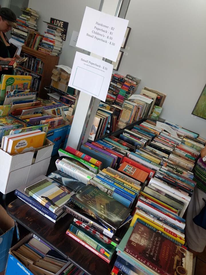 APARC is having a book and cat sale today! Best of both worlds of course.