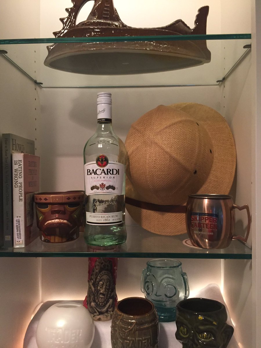 TimWallaert's tweet image. New display case over the bar...Trader Sam's meets Skipper Canteen meets Jock Lindsay's @DrunkAtdisney