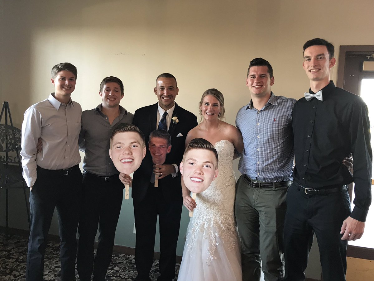 MNWarriors's tweet photo. Bride and groom with his players and some of those that were unable to attend #Navy https://t.co/hIck02lhqw