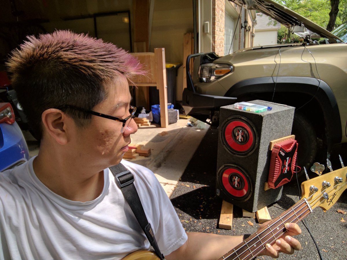 filbertman's tweet photo. is playing bass in the driveway with subwoofers hooked to his truck.  Is this punk or red neck? https://t.co/NHfG2kuxEd